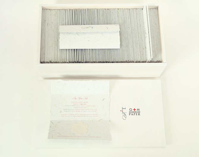 white and monogram handmade paper invitations